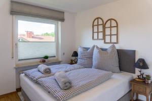 Postel nebo postele na pokoji v ubytování Große helle moderne Wohnung mit Balkon und Aussicht HBS