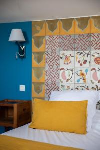 Oustau Camarguen Hôtel & Spa客房内的一张或多张床位