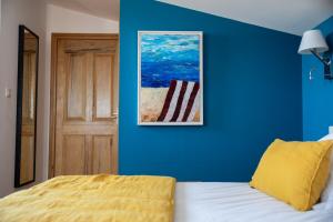 Oustau Camarguen Hôtel & Spa客房内的一张或多张床位