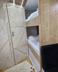 En eller flere senge i et værelse på יהליס קראוונים - לנפוש על גלגלים