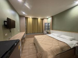 Photo de la galerie de l'établissement เดอเนส บูติก โฮม C3 Denest Boutique Home, à Ban Phai 15 autres photos