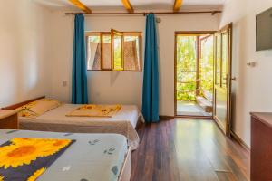 Postel nebo postele na pokoji v ubytování Casa Dexter