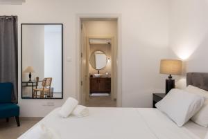 Ένα ή περισσότερα κρεβάτια σε δωμάτιο στο Modern 1BR Spacious Apartment with Terrace - Close to St Thomas Bay