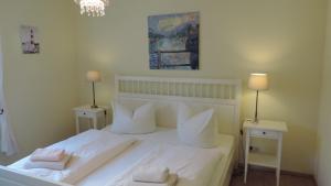 Postel nebo postele na pokoji v ubytování Akazienhaus 1