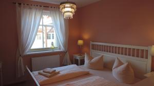 Postel nebo postele na pokoji v ubytování Akazienhaus 1