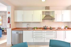 A kitchen or kitchenette at Villa Gran Canaria Specialodges