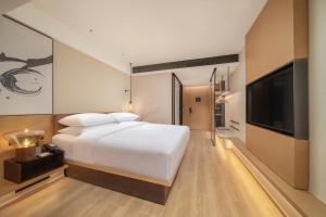 TV a/nebo společenská místnost v ubytování Fairfield by Marriott Shenzhen Dameisha