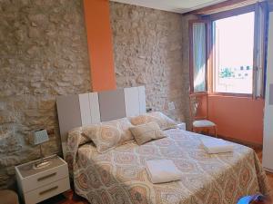 Posteľ alebo postele v izbe v ubytovaní Ronda del Castillo