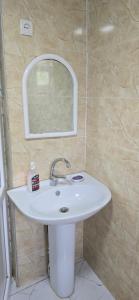 Koupelna v ubytování Guesthouse Robinzon Lalkhori + 37 fotografií
