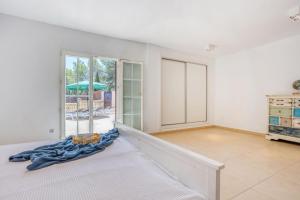 Posteľ alebo postele v izbe v ubytovaní Villa Escaletas