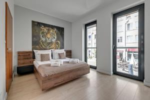 Posteľ alebo postele v izbe v ubytovaní Symfonia Amazing River View Apartment by Downtown Apartments