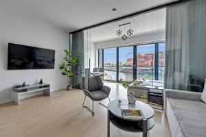 Posedenie v ubytovaní Symfonia Amazing River View Apartment by Downtown Apartments