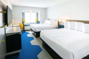 Postel nebo postele na pokoji v ubytování Microtel Inn & Suites by Wyndham Olean