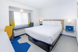 Postel nebo postele na pokoji v ubytování Microtel Inn & Suites by Wyndham Olean