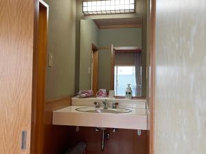 Koupelna v ubytování 瀬波 清波温泉