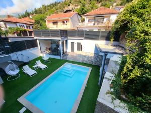 an aerial view of a house with a swimming pool at Herzegovina Dream Residence in Stolac