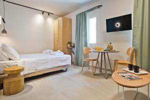 Postel nebo postele na pokoji v ubytování Conchilia Houses