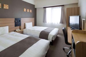 TV a/nebo společenská místnost v ubytování Comfort Hotel Sakai