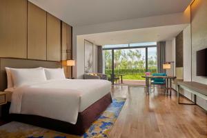 Voodi või voodid majutusasutuse Hilton Shanghai Fengxian toas
