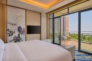 Voodi või voodid majutusasutuse Hilton Shanghai Fengxian toas
