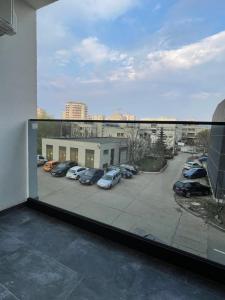 a view from a window of a parking lot at 2 Rooms Apartament Q Residence in Iaşi