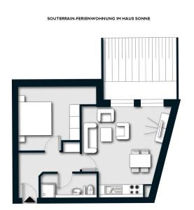a black and white floor plan of a house at Apartmenthaus Haus Sonne I direkt am Strand in Dierhagen