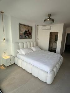 Ένα ή περισσότερα κρεβάτια σε δωμάτιο στο Casa San Juan 10