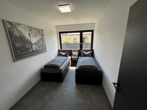 Postel nebo postele na pokoji v ubytování Ferienhaus Petersberg