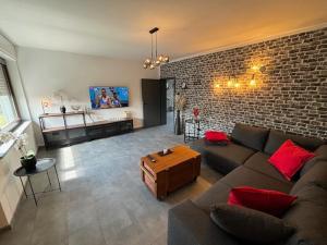TV a/nebo společenská místnost v ubytování Ferienhaus Petersberg