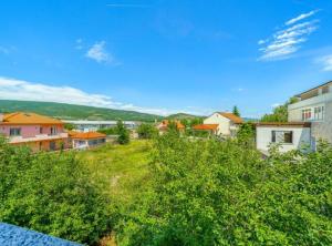 a view of a town with houses and trees at Villa Dreamin with Heated Pool & Hot Tub in Kraj