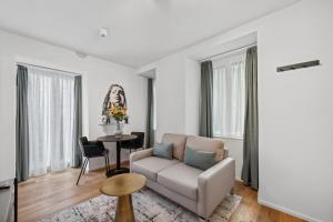 Area soggiorno di GLANDON Rooms Haldenhof - Self-Check-In