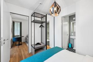 Letto o letti in una camera di GLANDON Rooms Haldenhof - Self-Check-In
