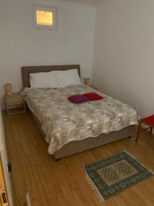 Postel nebo postele na pokoji v ubytování Apartment Roby