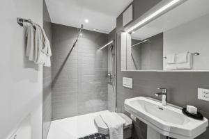 Bagno di GLANDON Rooms Haldenhof - Self-Check-In