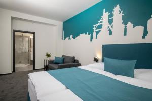 Postel nebo postele na pokoji v ubytování Design Hotel VP1 ART