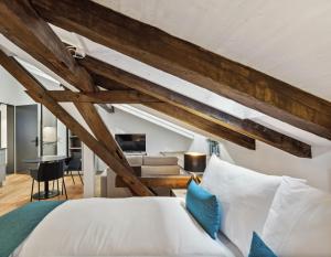Letto o letti in una camera di GLANDON Rooms Haldenhof - Self-Check-In