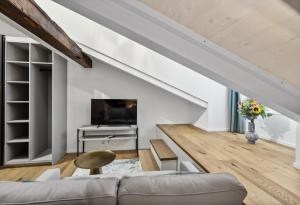TV o dispositivi per l'intrattenimento presso GLANDON Rooms Haldenhof - Self-Check-In