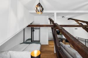 Letto o letti in una camera di GLANDON Rooms Haldenhof - Self-Check-In