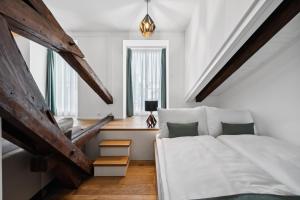 Letto o letti in una camera di GLANDON Rooms Haldenhof - Self-Check-In