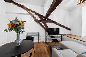 TV o dispositivi per l'intrattenimento presso GLANDON Rooms Haldenhof - Self-Check-In
