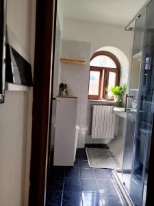 Koupelna v ubytování La rosa gialla