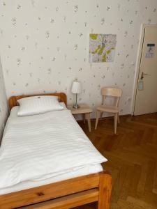 Postel nebo postele na pokoji v ubytování Hotel Villa Arnold