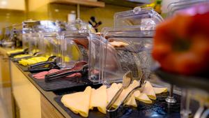 a counter with a bunch of cutting utensils at Tuzla Garden Hotel & Spa in Tuzla