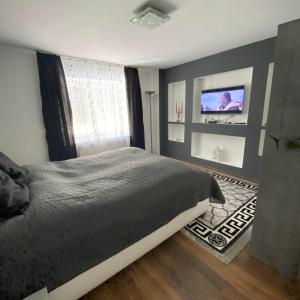 Postel nebo postele na pokoji v ubytování Perla Vendégház Igal