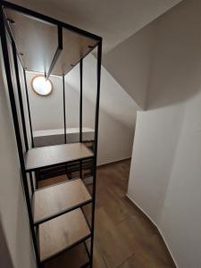 Postel nebo postele na pokoji v ubytování Apartmány Na rychtě