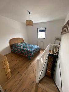 Postel nebo postele na pokoji v ubytování Maison 5min du vieux-Lille avec extérieur pour 1 à 6 personnes