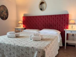 Postel nebo postele na pokoji v ubytování L'Orto