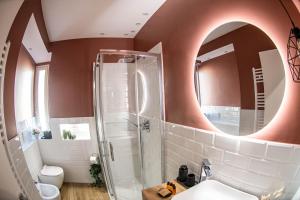 a bathroom with a sink and a mirror at Residenza dei Papi - Luxury City House in Castel Gandolfo +45 photos