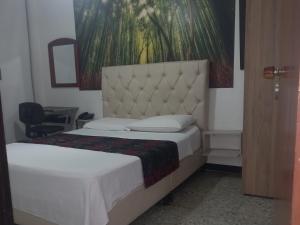 Postel nebo postele na pokoji v ubytování Hotel Los Cristales + 1 fotografie
