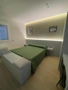Postel nebo postele na pokoji v ubytování B&B IL Lux